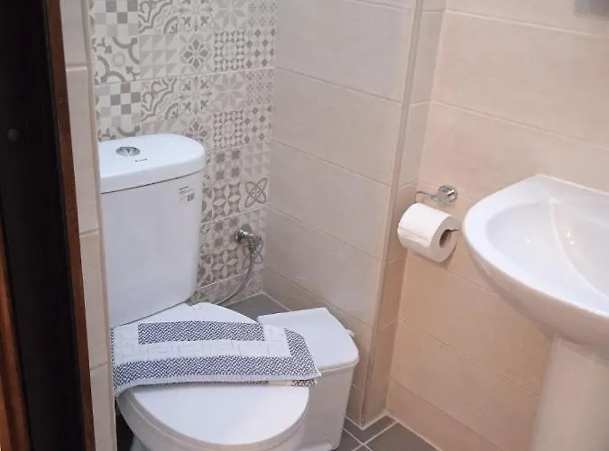 Marina's - White & Stone Daire Olympiada
